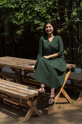 Bottle Green Calf Length Dress With 3/4 Sleeves